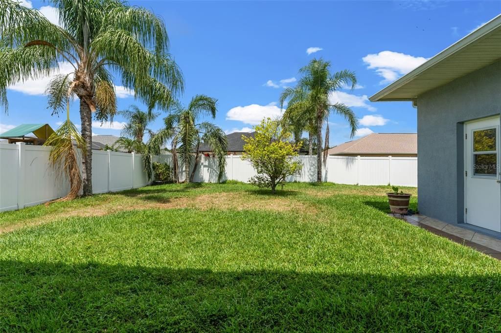 Private fenced backyard