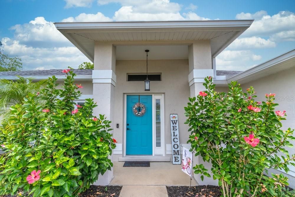 Such a welcoming covered front porch