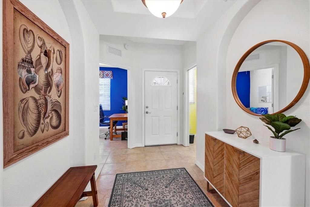 Inviting entryway, 3rd bedroom on left, laundry room on right