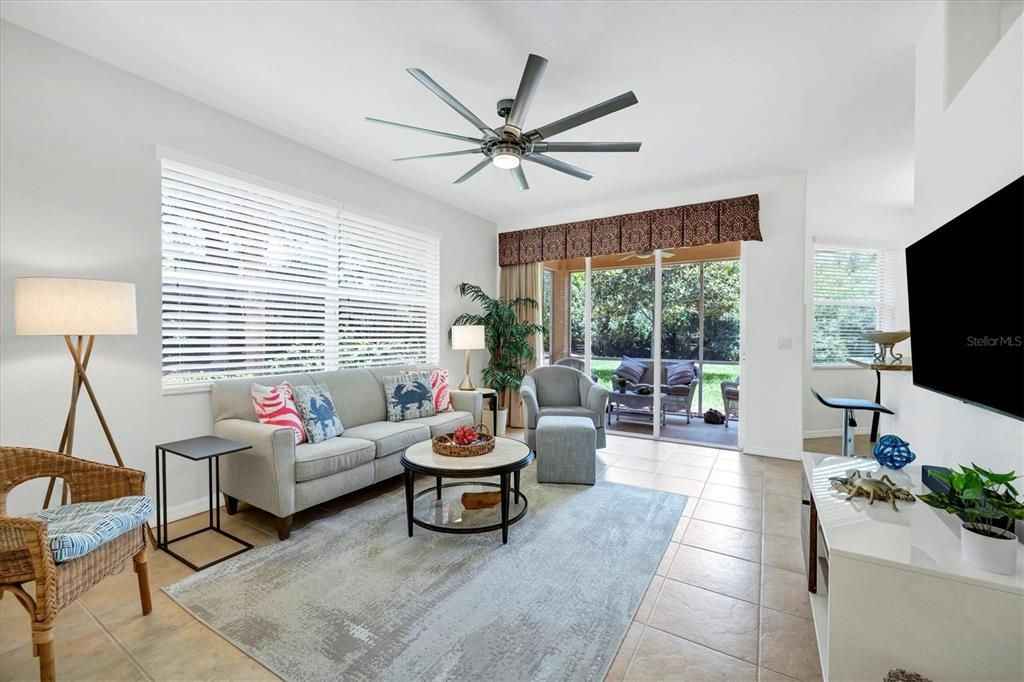 Living room looking out onto screened patio