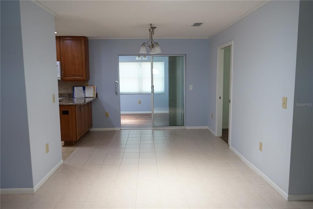 dining room and slider out to bonus room