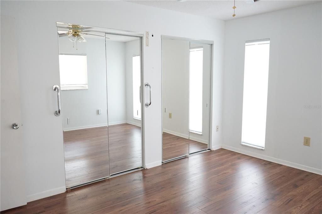 bedroom 3 with closet and 2 pocket doors