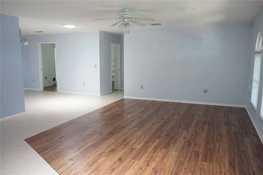 laminate floor in living space with hall to 2 bedrooms