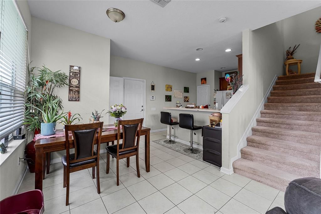 Upon entering to your left is the kitchen with plenty of space for a dinette or bistro set.