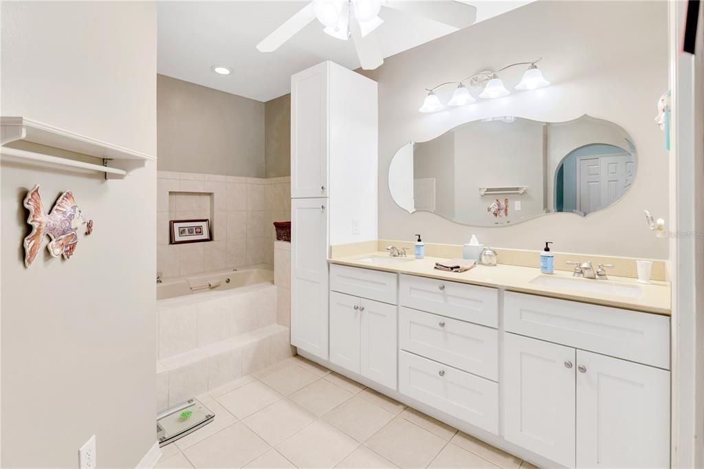 Primary bathroom with double sinks quartz counter top.