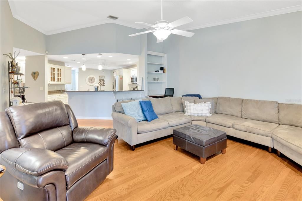 view of the family room glancing back toward the kitchen.