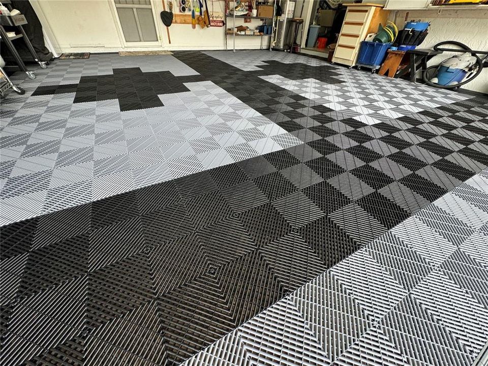 Easy-maintenance interlocking floor tile in garage