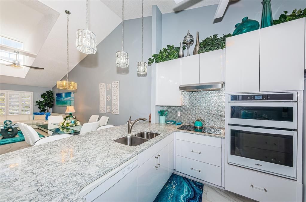 Beautiful white cabinets with soft-close drawers gives a very open feeling