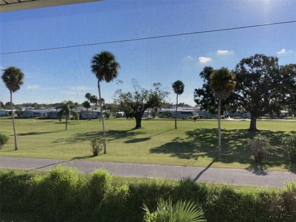 View of golf course from porch.