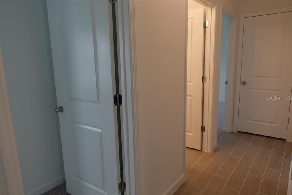 Entrance to additional bedrooms & bathroom