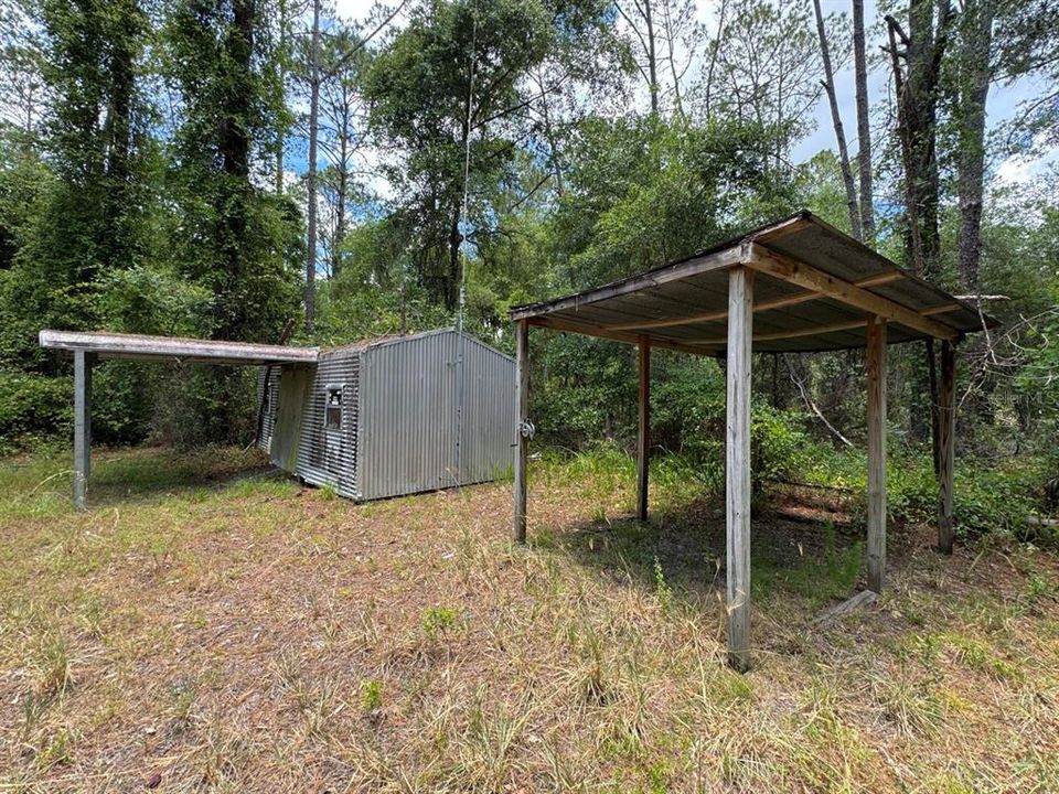 Storage building (1 of 2) & covered boat/utv parking