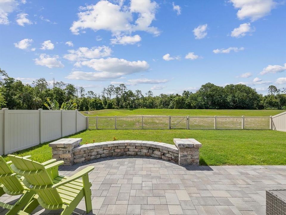 Stunning conservation views from your private The 21’ X 12’ Concrete Paver sitting area and backyard on a beautiful setting where you can watch wildlife such as deer, birds, and more while you relax.