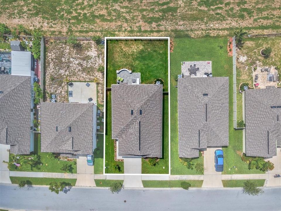 Aerial view of the property with estimated property lines