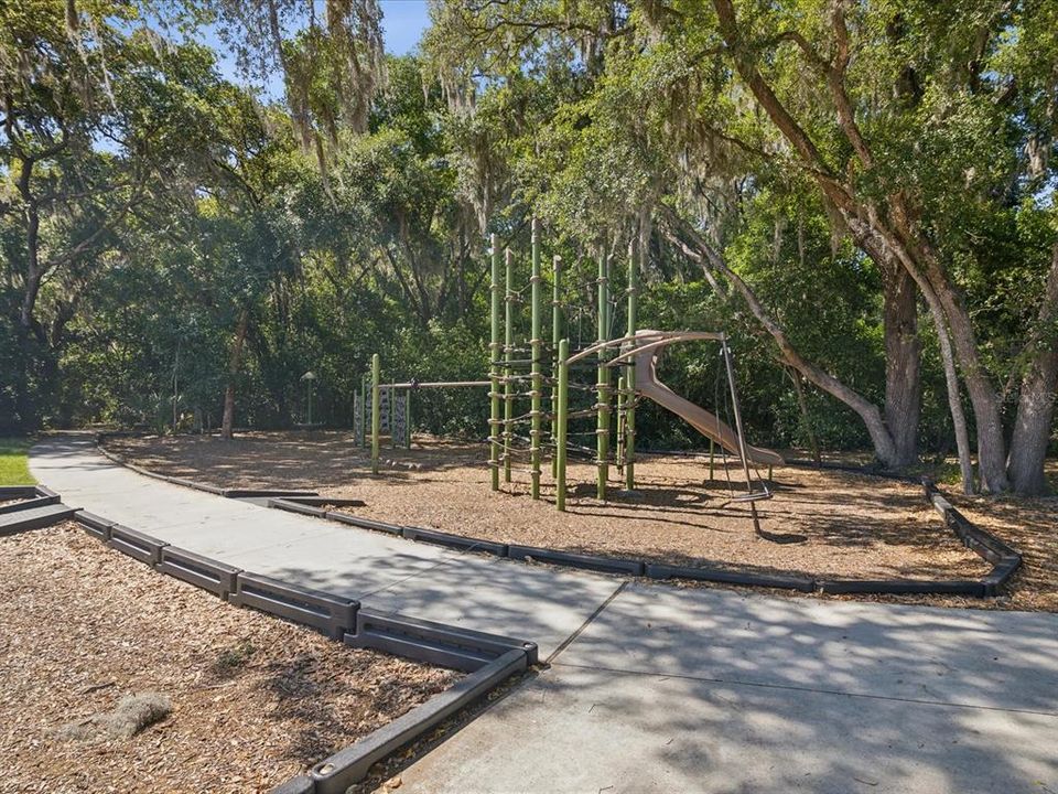 View of the community playground area next to the pool and pavilion area