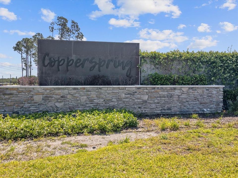 View of the Copperspring Neighborhood Entrance sign