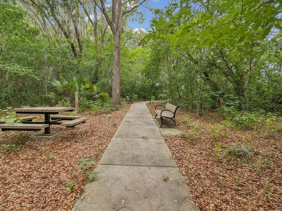Picnic tables along the nature pathway