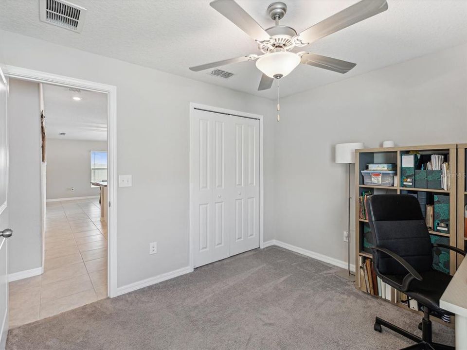 Guest bedroom currently being used as an office space