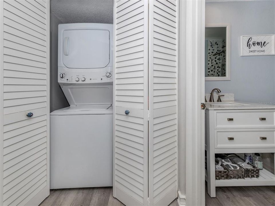 Stackable washer/dryer in unit