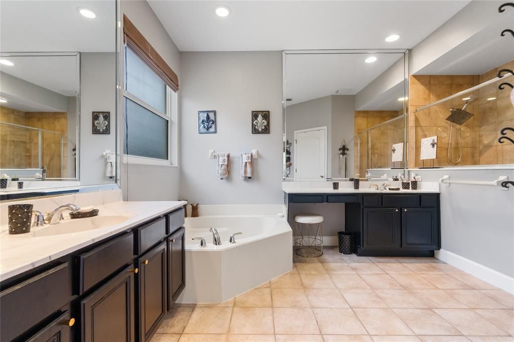 Separate Dual Vanities.   Soaking TUb and Large Walk in Shower for Primary En-Suite