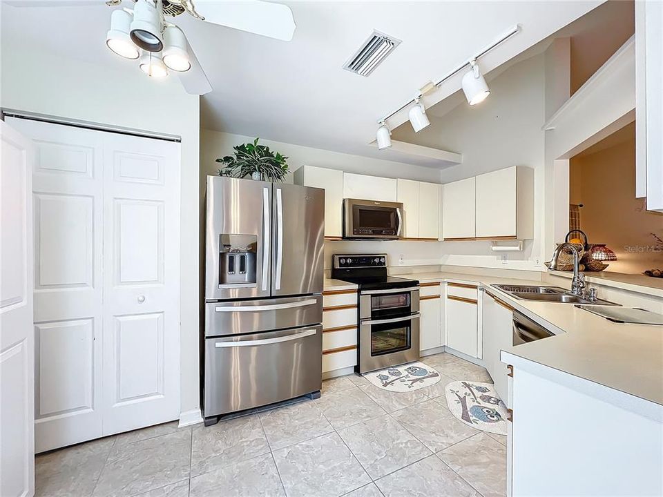 Kitchen with stainless steel appliances.  Note the double oven.