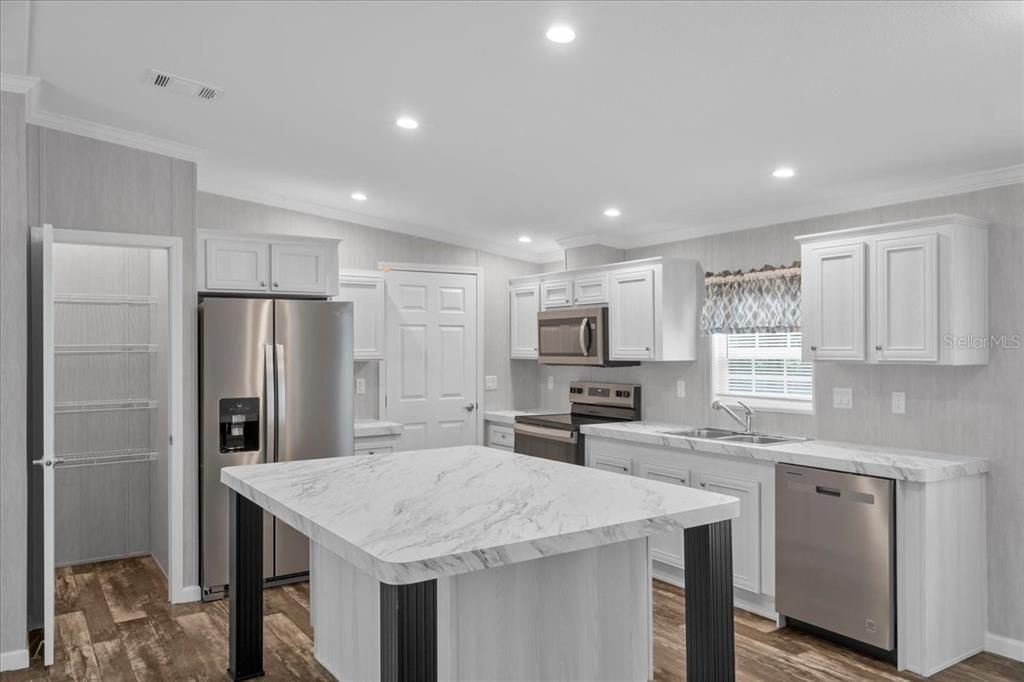 Kitchen w/Stainless Steel Appliances & Island