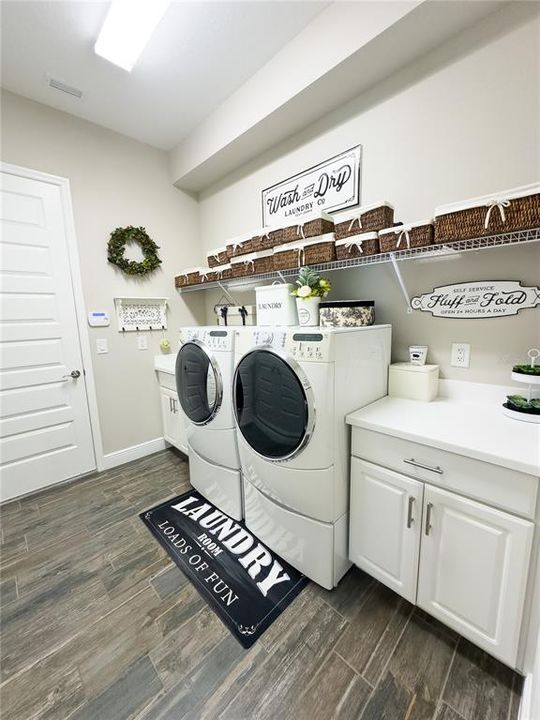 Laundry Area With Counter Space & Tub