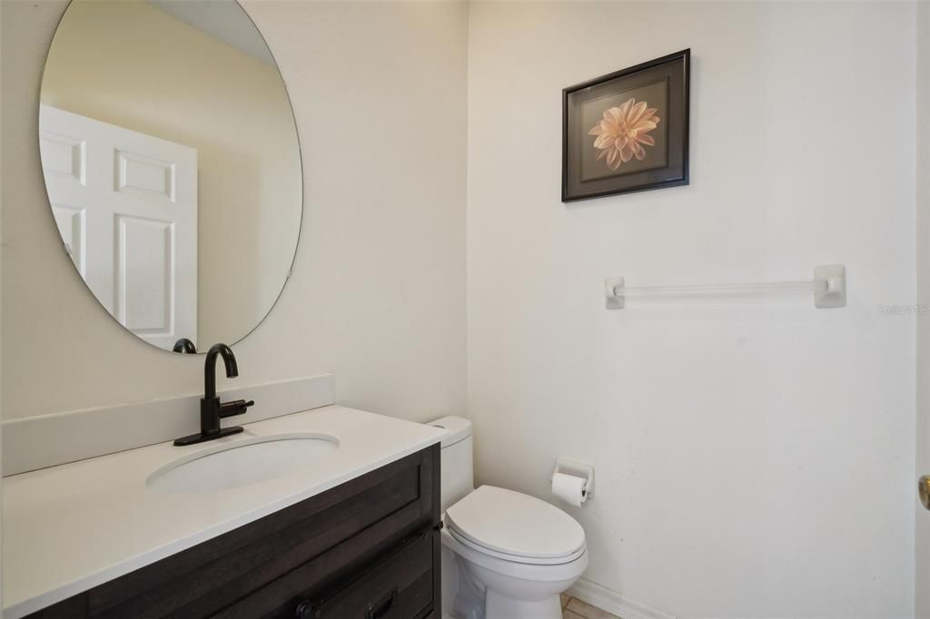 Downstairs Half Bath by 2nd Bedroom and Pool