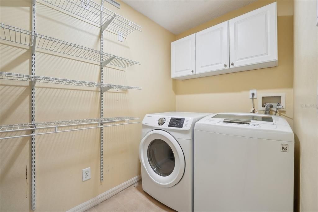 Large Laundry Room with plenty of storage space