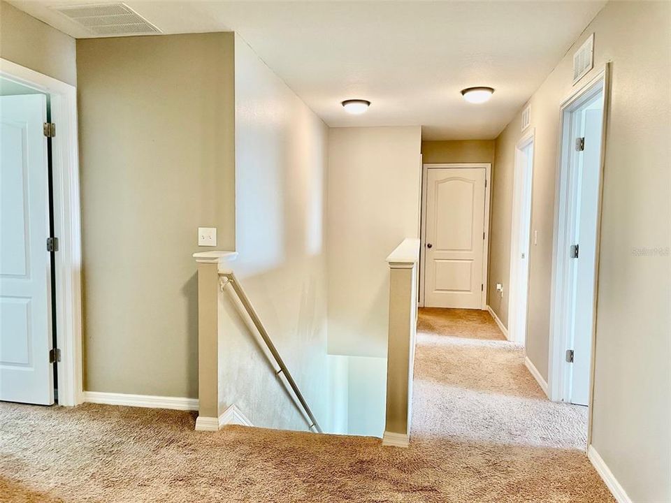 Second floor landing and hallway to all 4 Bedrooms.