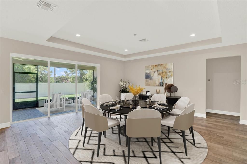 There are WOOD LOOK PORCELAIN TILE FLOORS throughout the living, dining, kitchen and in-law suite with plush carpet in the rest of the bedrooms. Virtually Staged.