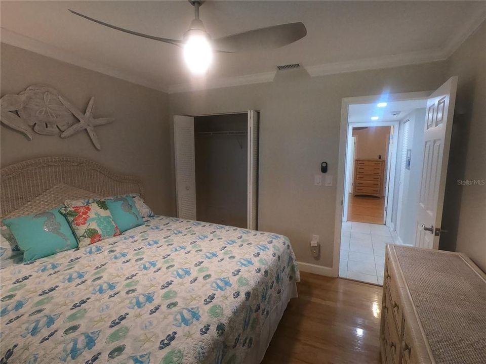 Guest bedroom looking towards closet and hall