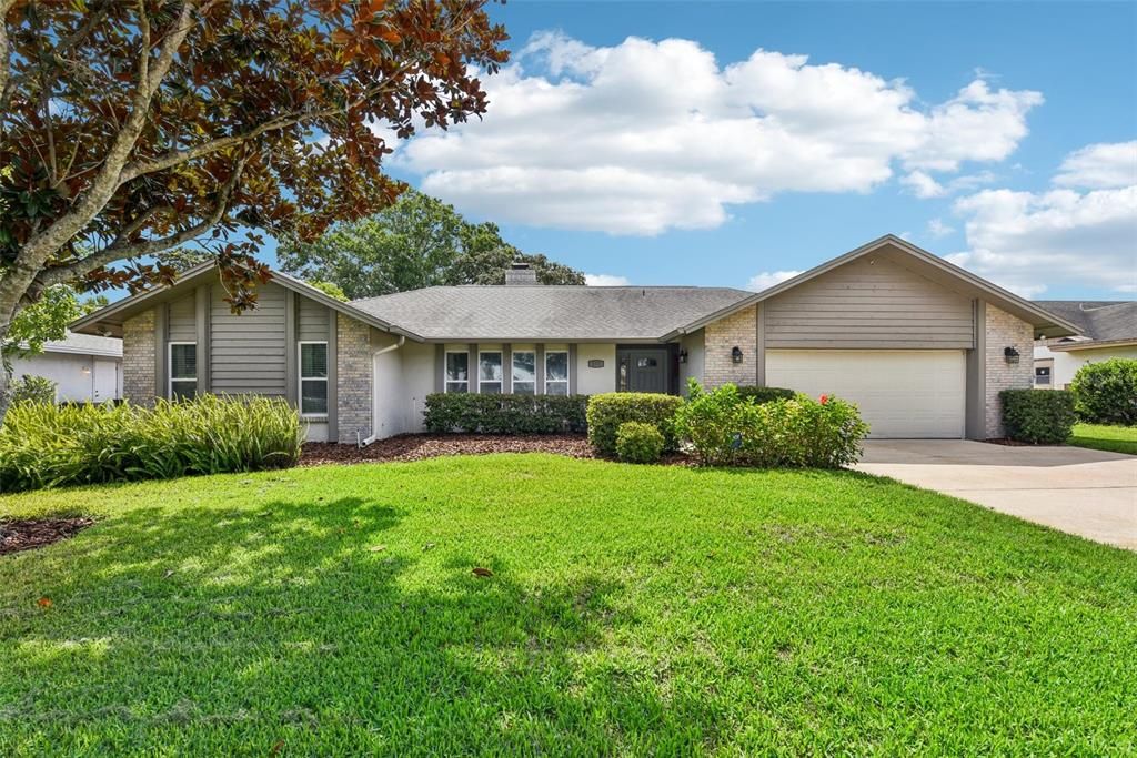 PRIDE OF OWNERSHIP is EVIDENT EVERYWHERE in this BEAUTIFULLY UPGRADED AND IMMACULATELY MAINTAINED MODEL POOL HOME with DIRECT GOLF COURSE FRONTAGE on the FAIRWAY of the 6th Hole on the Popular CASSELBERRY GOLF CLUB!