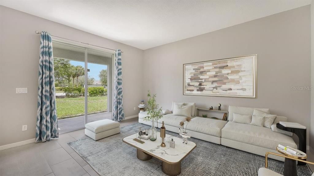 Living room featuring sliding glass doors to the covered lanai.