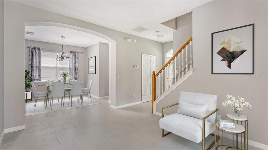 Front Foyer leading into the family room and Dining room.