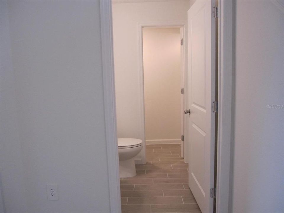 Half bathroom & storage closet