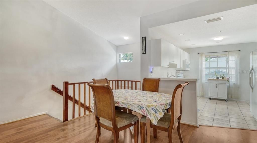 Dining room between the living room and kitchen.