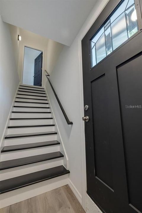 Stairway to upstairs unit