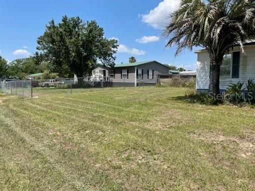 Shed, RV Carport, Side Yard, and Dry Pond