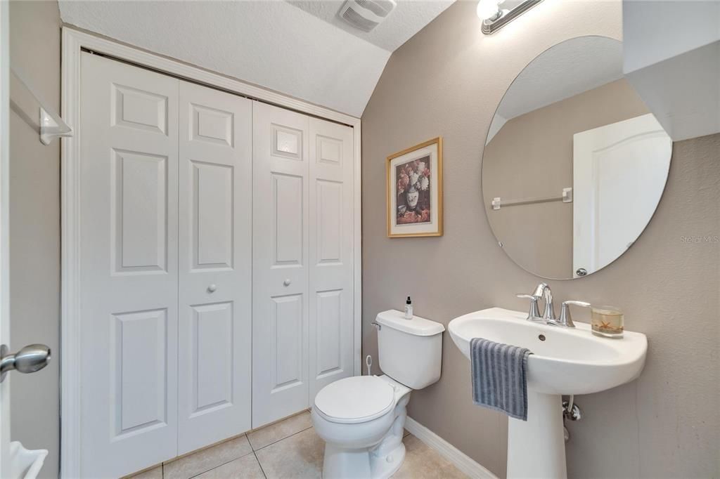 Spacious half bath on main level.