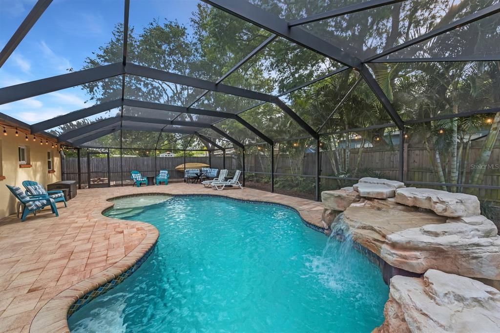 Spacious pool area. Heated, salt-water pool with water fall and splash pad.