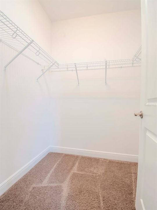 Primary walk-in closet (one of two)