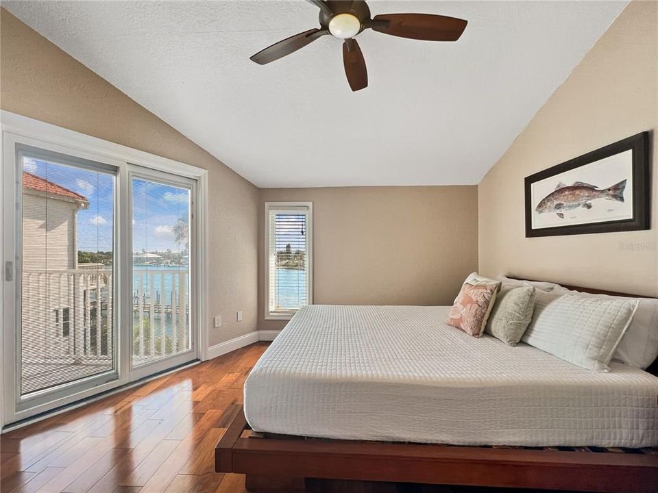 2nd floor primary bedroom with balcony access, ensuite bathroom, walk-in closet, and laundry