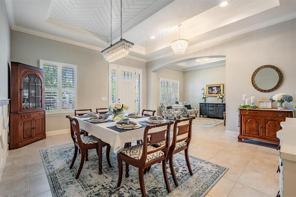 Formal dining room, foyer overlooking office/flex space