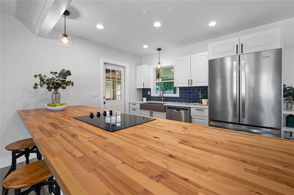 Well maintained butcher block countertop.