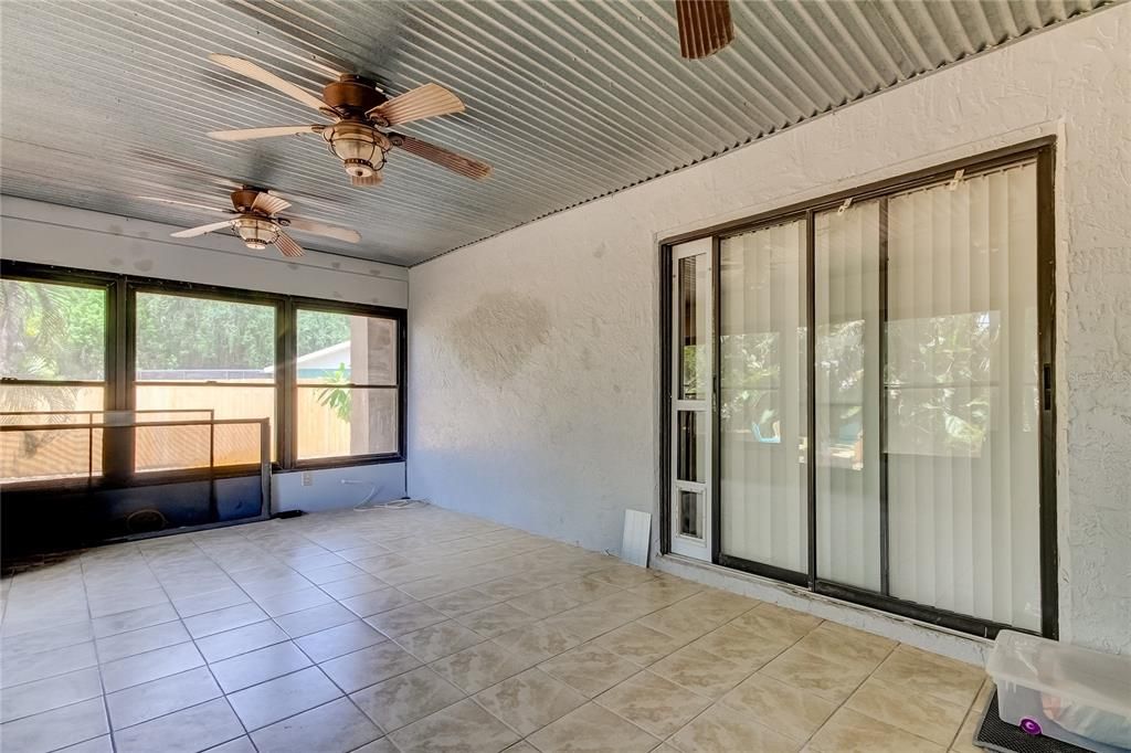 Lanai, Screened in, with 2 Sets of Sliders from Primary Bedroom & Dining/Great Room!
