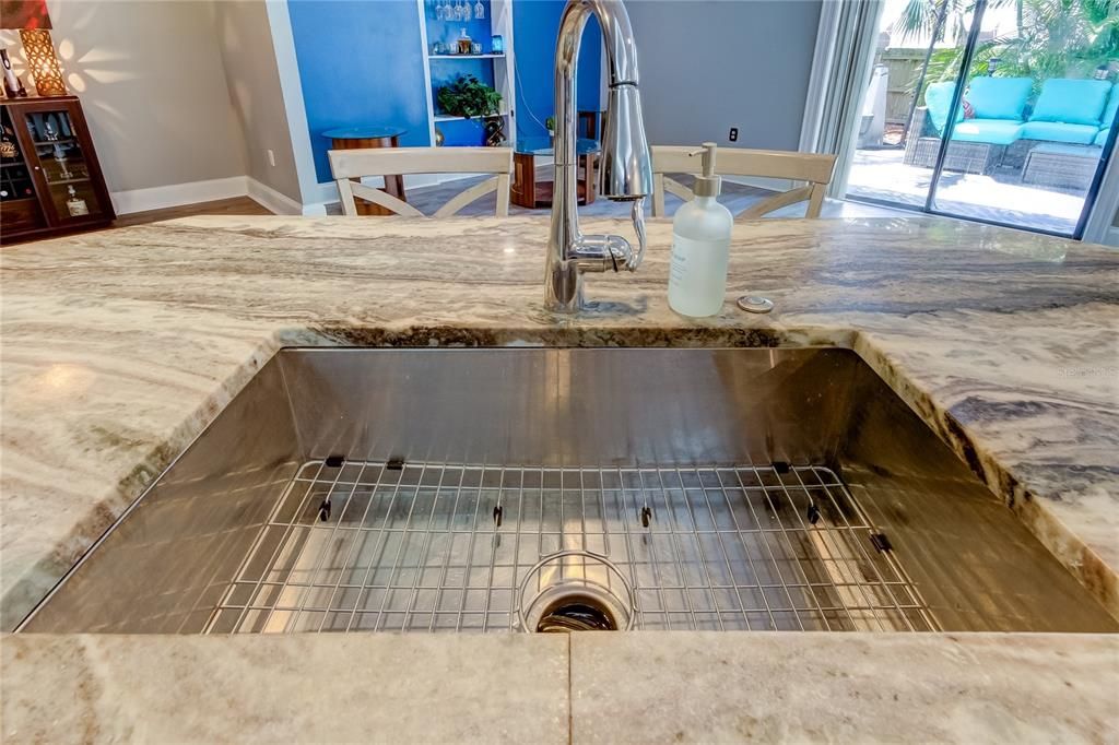 Custom Oversized Sink is Exactly Positioned to keep you part of the action in the Living Space!