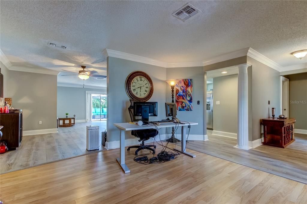 From the Living Room, you can see the 'GREAT ROOM' behind the wall dividing the Great Room from the Living Room for some degree of Privacy!!