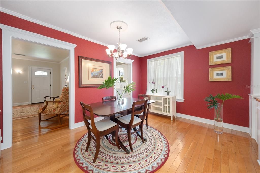 Dining room adjacent to the kitchen, living and Florida rooms.