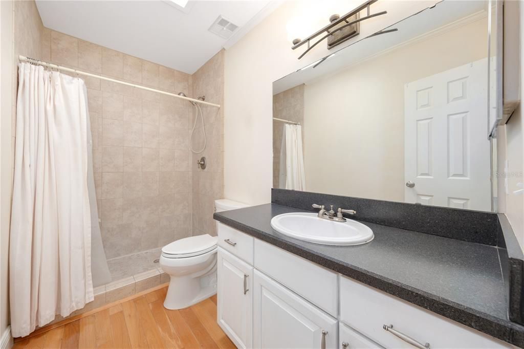 Primary ensuite with large walk-in shower.