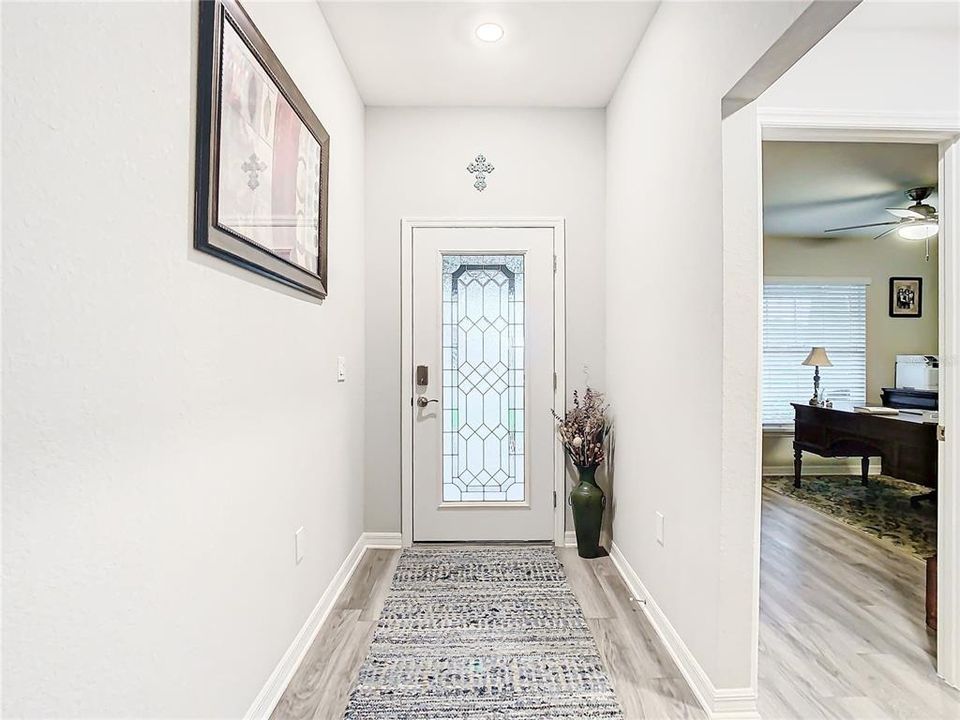 Front door with etched glass lets in natural light